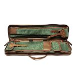 A FINE TAKE-DOWN SOFT LEATHER SUEDE-LINED GUNCASE, fitted for 30in. barrels, the interior lined with