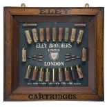 A VINTAGE ELEY BROTHERS LTD. CARTRIDGE DISPLAY BOARD, in a glazed wooden frame, consisting of