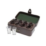 REY PAVON A LEATHER CASED EIGHT SHOT GLASS SET, dark leather case with leather interior. † Please