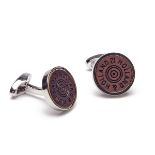 A PAIR OF UNUSED WALNUT CARTRIDGE HEADSTAMP CUFFLINKS, in the form of a Holland & Holland 12-bore