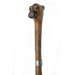 A VICTORIAN GENTLEMAN'S WALKING-CANE WITH BOXER-DOG POMMEL, dated for 1879, 36in. overall, the shaft
