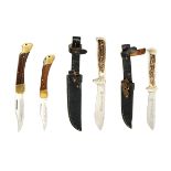 PUMA, SOLINGEN FOUR BOXED SPORTING-KNIVES, including a Model 965 Deer-Hunter lock-knife with 3in.