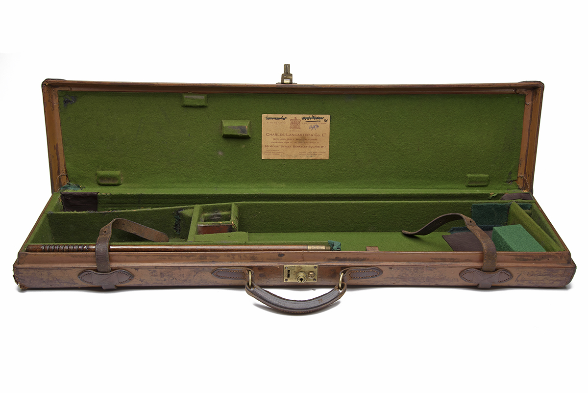 A LEATHER LIGHTWEIGHT SINGLE GUNCASE, fitted for 28in. barrels (could adapt to 30in.), the