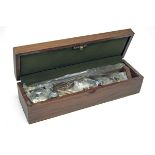 A NEW & UNUSED OAK CASED 'PRESENTATION' GUN CLEANING KIT, comprising of an oil bottle, a pair of