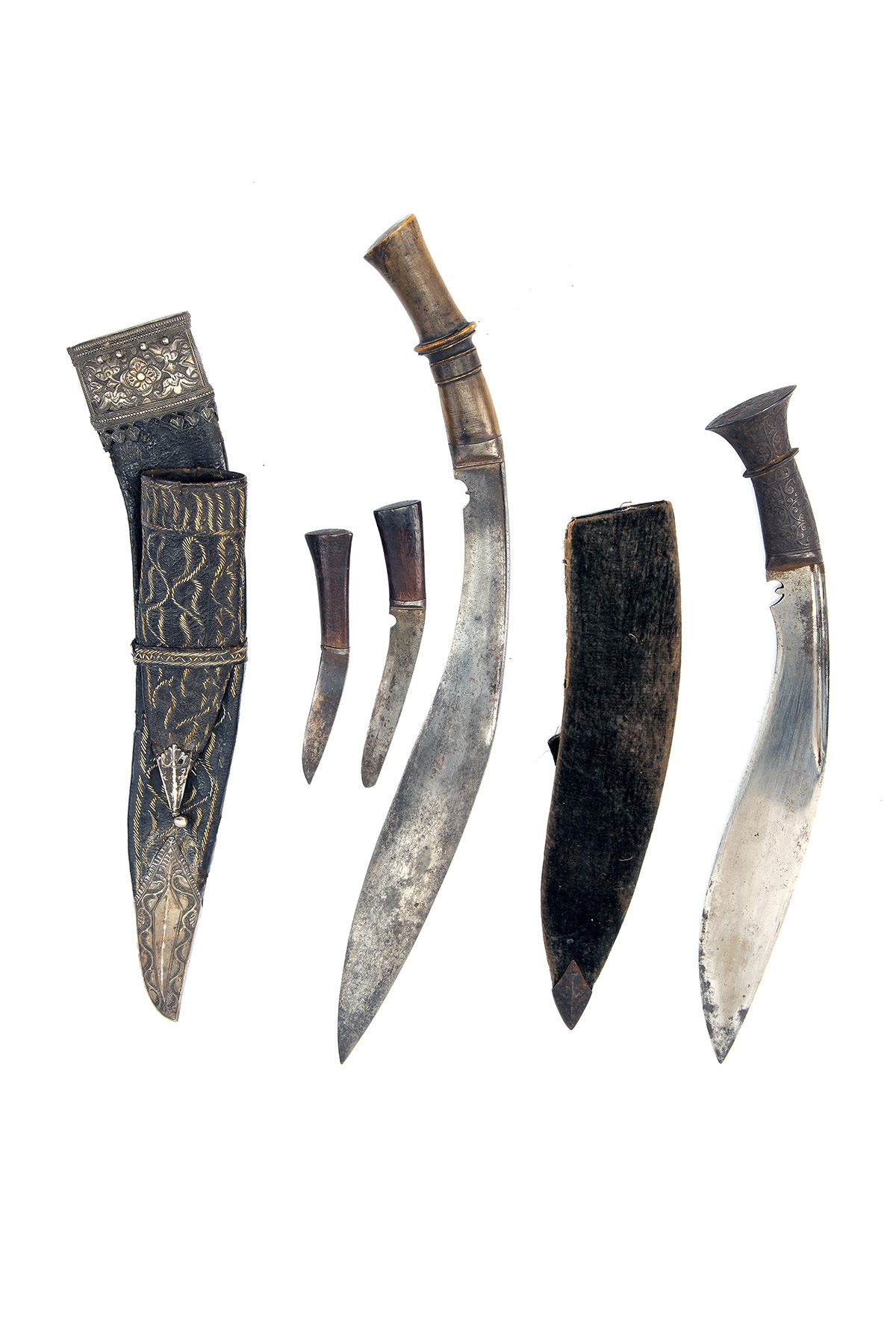 TWO LATE VICTORIAN KUKRI KNIVES, both circa 1890 and Northern Indian or Nepalese, the first with