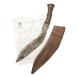 A WORLD WAR TWO KUKRI KNIFE SIGNED 'H.W.', dated for 1945 and made for the Indian Army, with