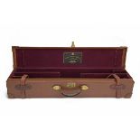 JAMES PURDEY & SONS A LEATHER DOUBLE MOTOR CASE, fitted for 30in. barrels, the interior lined with