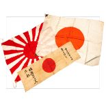 THREE WORLD WAR TWO JAPANESE FLAGS or BANNERS, including a raw silk example with national emblem and