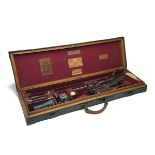 JAMES PURDEY & SONS A BRASS-CORNERED OAK AND LEATHER SINGLE GUNCASE WITH ACCESSORIES, fitted 30in.