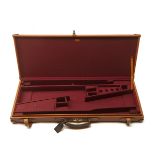 PARSONS A LEATHER DOUBLE GUNCASE, fitted for 32in. barrels, the interior lined with maroon baize,
