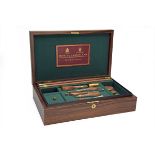 HOLLAND & HOLLAND A PRESENTATION 'CAVALIER' GUN ACCESSORY AND CLEANING KIT, lid marquetry-inlaid