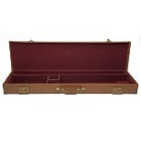 A BRADY TYPE LEATHER SINGLE GUNCASE, fitted for 30in. barrels, the interior lined with maroon baize,