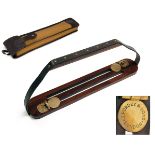 JAMES PURDEY & SONS AN UNUSED JAMES PURDEY & SONS ROSEWOOD AND LEATHER GAME CARRIER, with brass