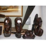 Carved African wooden busts, spear etc