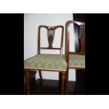 Three rosewood side chairs