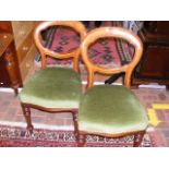 A set of four Victorian dining chairs