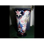 A Moorcroft Pottery vase with tube line decoration