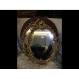 Two decorative wall mirrors and one other