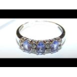 A 14ct white gold tanzanite and diamond ring - Siz