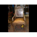 The matching inlaid armchair