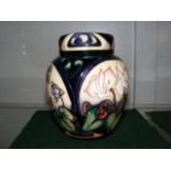 A Limited Edition Moorcroft Pottery jar an cover w