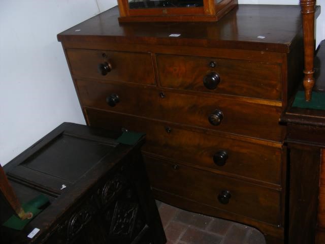 A Victorian mahogany chest of two short and three