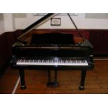 A Yamaha C1 baby grand piano in high gloss black - as n