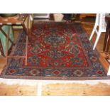 A Middle Eastern rug with geometric border - 235cm