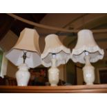 Three onyx table lamps