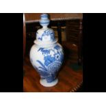 An 18th century blue and white vase with cover (dr