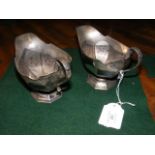 A pair of silver sauce boats with Sheffield hallma