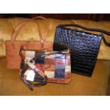 A vintage ladies handbag and two others