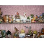 Two shelves of collectable ornaments