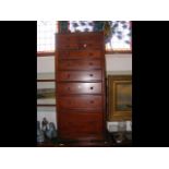 An antique mahogany narrow multi-draw chest - 54cm