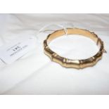 A ladies 9 carat bangle