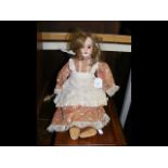 An antique bisque head doll with mark SFBJ Paris -