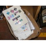 A box containing various stamps from around the Wo