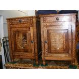 The matching pair of inlaid bedroom cabinets with