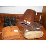 A pair of military binoculars with carrying case a