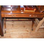 An elegant mahogany sofa table with single drawer
