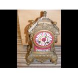 A French gilt mantel clock - 28cms high