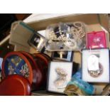 A box of costume jewellery including brooches, nec