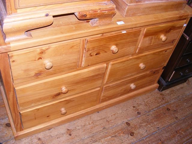 A pine multi-drawer chest