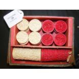 A selection of old Chinese backgammon disc with dice shakers