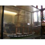 A model ship in perspex case