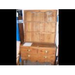 A Victorian pine dresser with three drawers below