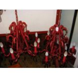 Two unusual red glass chandeliers