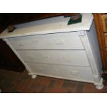 An antique French cream painted chest of three lon