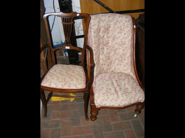 An inlaid Edwardian armchair together with a nursi