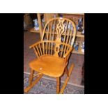 A country slat back rocking chair